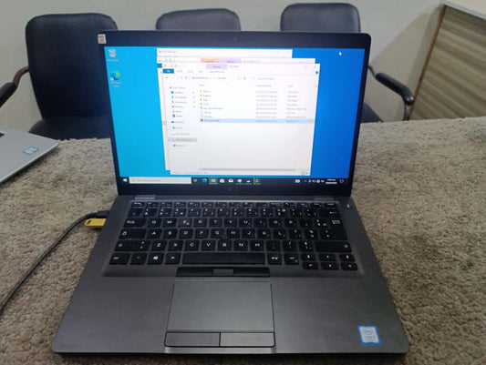 Dell 5400 metal body laptop side view